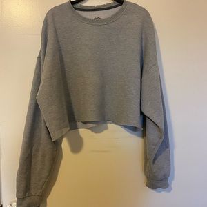 Cropped distressed sweater